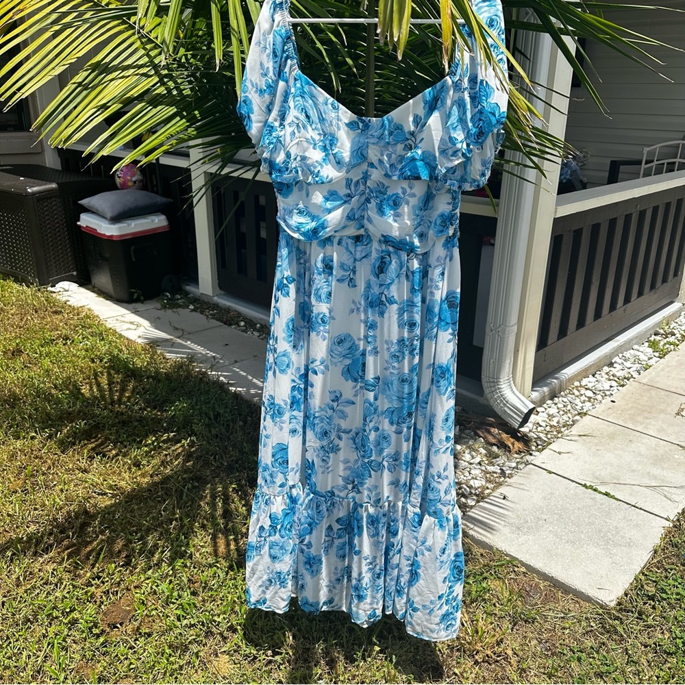 White and blue floral dress by Luxology.